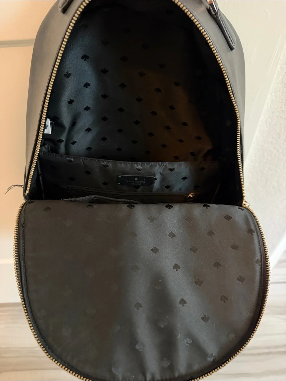 kate spade black saffiano leather backpack with silver-tone hardware